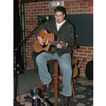 Chris sang and played beautifully.